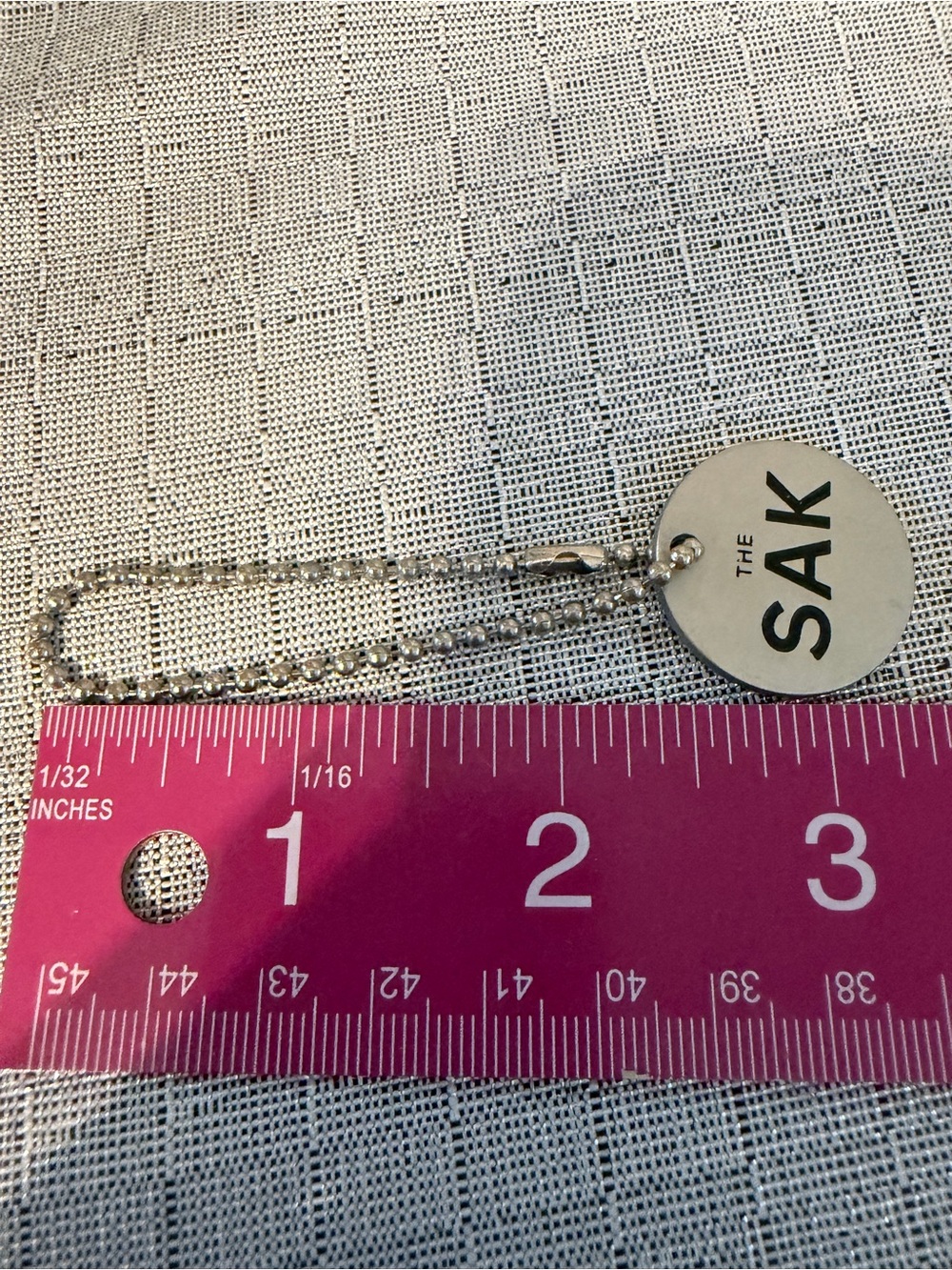 The Sak Silver Logo Charm Keychain - Picture 3 of 3